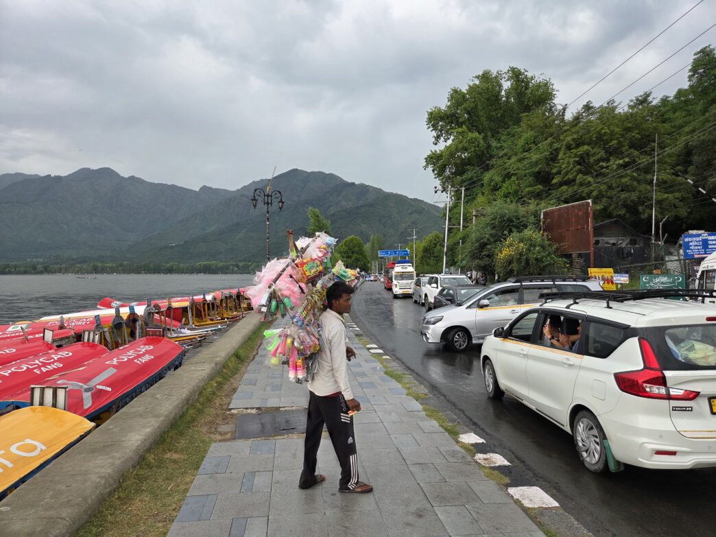 Dark clouds hang over Dal Lake after rain, thunderstorms and gusty winds swept parts of Srinagar